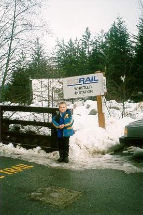 Max at the Whistler Station sign